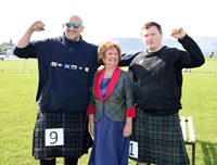 Gourock Highland Games 2023. 'Heavies' competitors with Chieftain Dr Liz Cameron CBE.