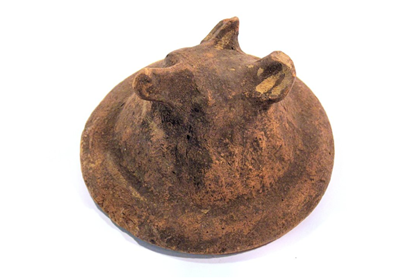 Canopic jar lid decorated as Duamutef, one of the four sons of Horus, normally portrayed as a mummified jackal. New Kingdom Period, 1550 BC -1070 BC. Excavated at Abydos - 1981.971 - © McLean Museum and Art Gallery, Greenock.