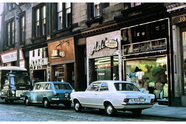 Shops in West Blackhall Street, Greenock. This colour transparency was taken by Eugene Jean Méhat (1920-2000) in 1967. - 2008.72.615 - © McLean Museum and Art Gallery, Greenock.