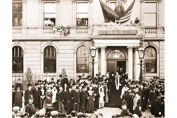 Greenock Public Library opening ceremony on 10 October 1902. A gold key with a design of a ship within a shield in the middle of the key was used by Mrs. Carnegie during the ceremony. Bromide print on paper - © McLean Museum and Art Gallery, Greenock.
