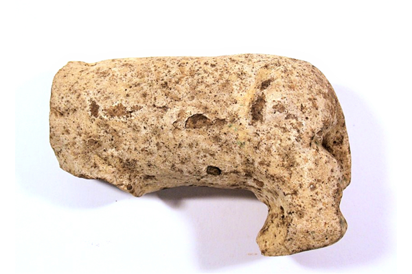 Clay figure of animal, period unknown, possibly a hippopotamus, lacking head and fore legs. Inscribed in paint with old dig number M69. Excavated at Temple area M69 at Abydos in 1899-1903 by Sir William Matthew Flinders Petrie (1853-1942) for the Egypt Exploration Fund, London. - 1981.948 © McLean Museum and Art Gallery, Greenock.