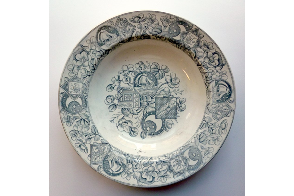 Late 19th century glazed ceramic soup plate manufactured by the Clyde Pottery Company, Greenock. Decorated with the 'Mayflower' in belt and buckle decorated with 'C.P. Coy' inside. Purchased with grant-aid from the National Fund for Acquisitions. - 2001.11 - © McLean Museum and Art Gallery, Greenock.