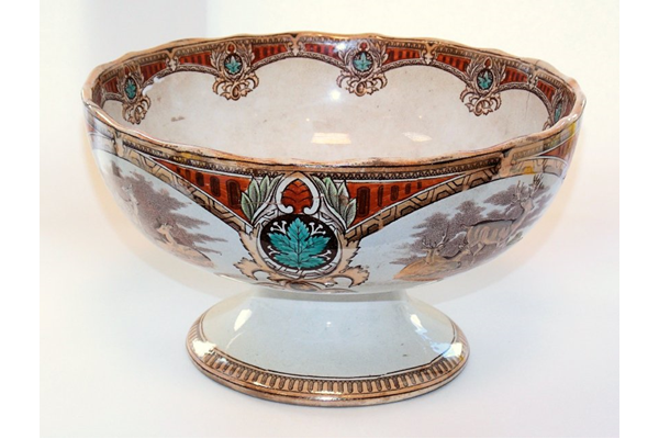 Late 19th century glazed ceramic punch bowl manufactured by the Clyde Pottery Company, Greenock. Decorated with the 'Stag' design pattern and mark 'Stag CP & Co.' - 2013.26 - © McLean Museum and Art Gallery, Greenock.