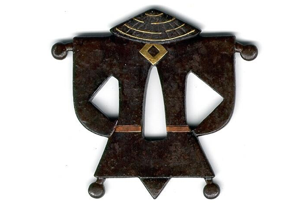 An eighteenth century Japanese swordguard or tsuba by Shigeyoshi Umetada. The tsuba is in the form of a kimono rack. - 1981.134 © McLean Museum and Art Gallery, Greenock