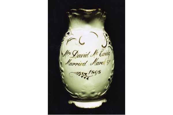 Clyde Pottery Marriage Jug with Murray Rose pattern inscribed 'Mrs David McEwing Married March 9th 1898'. The local press recorded the wedding: 'David McEwing, painter, was married to Mary Williamson, 3rd daughter of James McDougall, boatman, at 5 Regent Street, Greenock on 9th March 1898.' - 1980.109 - © McLean Museum and Art Gallery, Greenock