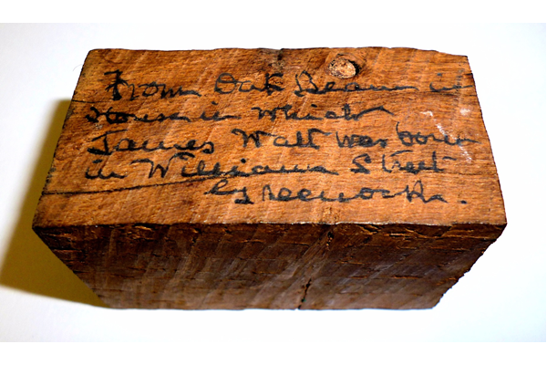Piece of oak with the handwritten inscription: 'from oak beam in house in which James Watt was born in William Street, Greenock'. - 1999.61 - © McLean Museum and Art Gallery, Greenock