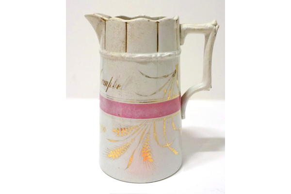 Glazed ceramic marriage jug manufactured by the Clyde Pottery Company, Greenock. Inscribed 'Mr. & Mrs. Walter Campbell 2 July 1890'. - 1977.271 - © McLean Museum and Art Gallery, Greenock.