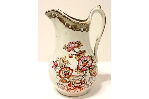 Glazed ceramic jug manufactured by the Clyde Pottery Company, Greenock. Decorated with the 'Oriental' pattern. Purchased with grant-aid from the National Fund for Acquisitions. - 1987.662 - © McLean Museum and Art Gallery, Greenock.