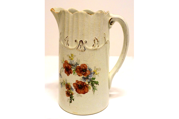 Marriage milk jug manufactured by the Clyde Pottery Company, Greenock. Floral design, escalloped edging and inscribed 'A present to Mr & Mrs Gemmell, married 31 Dec 1895' - 1997.114 - © McLean Museum and Art Gallery, Greenock.
