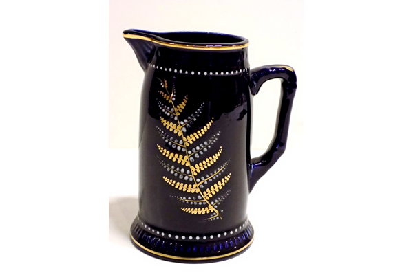 Jug manufactured by the Clyde Pottery Company, Greenock and decorated with the Mazarine Blue pattern ware with Prince of Wales' pattern. - L1977.165 © McLean Museum and Art Gallery, Greenock.