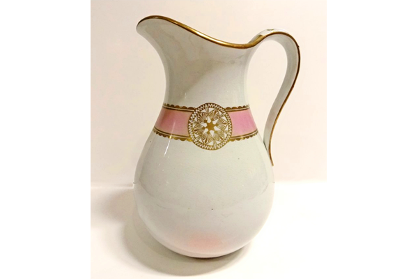 Ewer manufactured by the Clyde Pottery, Greenock. Decorated with a gilt rim with dentil edge. Made around 1877 - L1977.112.2 - © McLean Museum and Art Gallery, Greenock.