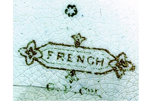 French pattern employs a design featuring a swain in 18th Century dress, leading his horse, conversing with a girl in a vineyard. Decorated with a border of vine-leaves. The pattern was much reproduced on jugs where it was printed in black, brown or puce often with a hand painted overglaze. The mark is in capitals in lozenge cartouche, with C.P.Co. underneath. © McLean Museum and Art Gallery, Greenock.