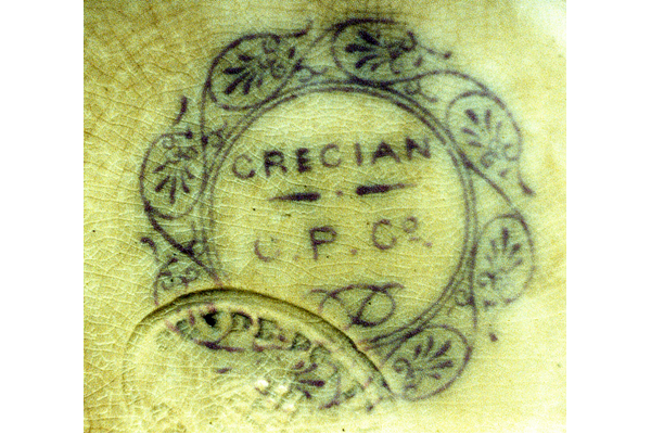 ‘Grecian’ employs a classical scroll centre piece with stylised acanthus. The mark is GRECIAN over dotted line over C.P.Co. in a Grecian style rosette. Found on puce-printed tureen with dog-rose moulded handle but the same design appears on a plate marked J.&W.P. Bell. © McLean Museum and Art Gallery, Greenock.
