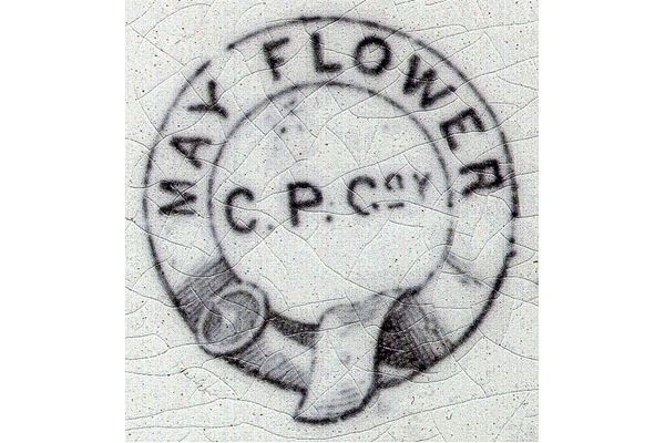 The design employs romanticised may-blossom with 'Mayflower' ship in reserves also heavenly bodies in geometric reserves. Usually printed in grey sometimes hand painted overglaze with orange-red rim on dinner service and punch-bowls. The mark is MAYFLOWER in garter with C.P.Coy. central. © McLean Museum and Art Gallery, Greenock.