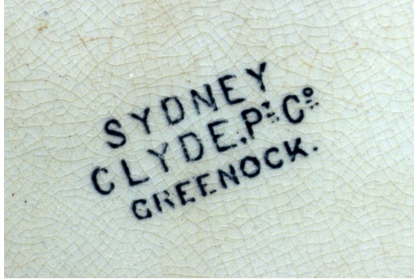 The Sydney pattern uses floral and geometric patterns; it has cornflower sprays (like Mayflower). The pattern has been found printed grey on plates and ashets. The mark is SYDNEY over CLYDE Pt. Co. over GREENOCK. © McLean Museum and Art Gallery, Greenock.