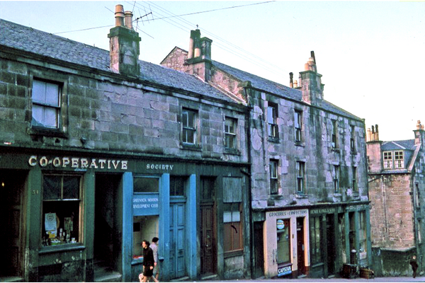 Transparency by Eugene Jean Méhat (1920-2000) showing a view of Ann Street, Greenock with the premises of Greenock Co-operative shop and the Greenock Morton Development Club. - 2008.72.215 - © McLean Museum and Art Gallery, Greenock.