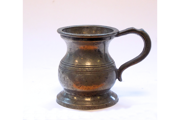 19th century pewter 1-4 gill measure made by Lawden & Poole, Birmingham with G (crown motif) R on base. Lawden & Poole, Birmingham. Inside stacked symbols: top diamond, inverted triangle and bottom X. - 1976.82 - © McLean Museum and Art Gallery, Greenock