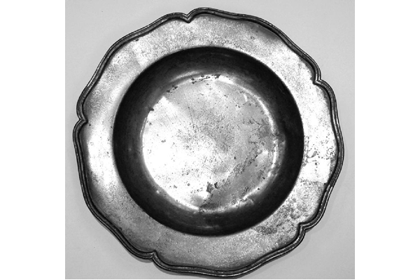 Eighteenth century domestic pewter plate made by Allan Stevenson, between 1720 and 1780. - 1976.115 - © McLean Museum and Art Gallery, Greenock