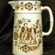 Late 19th century glazed ceramic jug manufactured by the Clyde Pottery Company, Greenock between 1875 and 1896. Decorated with the 'Tam O'Shanter' pattern. Purchased with grant-aid from the National Fund for Acquisitions. - 1987.665 - © McLean Museum and Art Gallery, Greenock.
