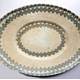 Late 19th century glazed ceramic ashet or serving plate manufactured by the Clyde Pottery Company, Greenock with a spongeware decoration. Purchased with grant-aid from the National Fund for Acquisitions. - 1987.687 - © McLean Museum and Art Gallery, Greenock.