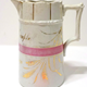 Glazed ceramic marriage jug manufactured by the Clyde Pottery Company, Greenock. Inscribed 'Mr. & Mrs. Walter Campbell 2 July 1890'. - 1977.271 - © McLean Museum and Art Gallery, Greenock. 