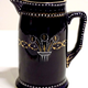  Jug manufactured by the Clyde Pottery Company, Greenock and decorated with the Mazarine Blue pattern ware with Prance of Wales' feather pattern. -  L1977.164 - © McLean Museum and Art Gallery, Greenock.