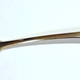 Silver toddy ladle with a fiddle and shell pattern engraved with the initial 'S'. Oval bowl with drop heel. Made by John Heron (fl 1815-1830), in 1824 with five marks: maker's name 'Heron' and four Edinburgh marks: king's head, castle, thistle and date mark 's' for 1824. One of a pair of ladles. - 1982.1 - ©McLean Museum and Art Gallery, Greenock.