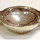 Greenock provincial silver quaich made by Nathaniel Hunter (fl 1775-1834). Two handles and plain design. Hallmarked 'NH' on side of base. - 2001.6 - ©McLean Museum and Art Gallery, Greenock. 