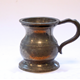 19th century pewter 1-4 gill measure made by Lawden & Poole, Birmingham with G (crown motif) R on base. Lawden & Poole, Birmingham. Inside stacked symbols: top diamond, inverted triangle and bottom X. - 1976.82 - © McLean Museum and Art Gallery, Greenock