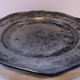 Eighteenth century domestic pewter dish by George Bacon (fl 1740-1760) of London. - 1976.112 - © McLean Museum and Art Gallery, Greenock
